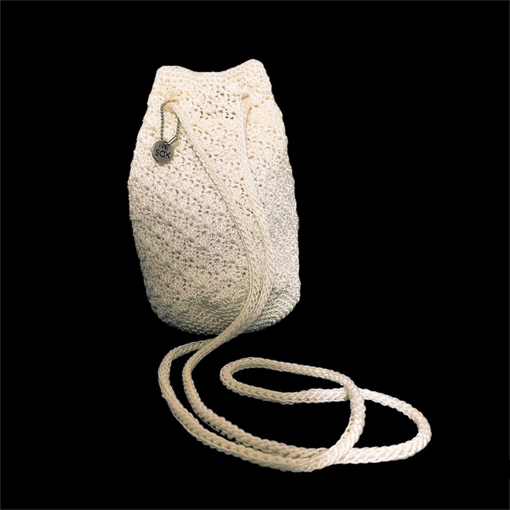 The Sak crochet mini drawstring bag